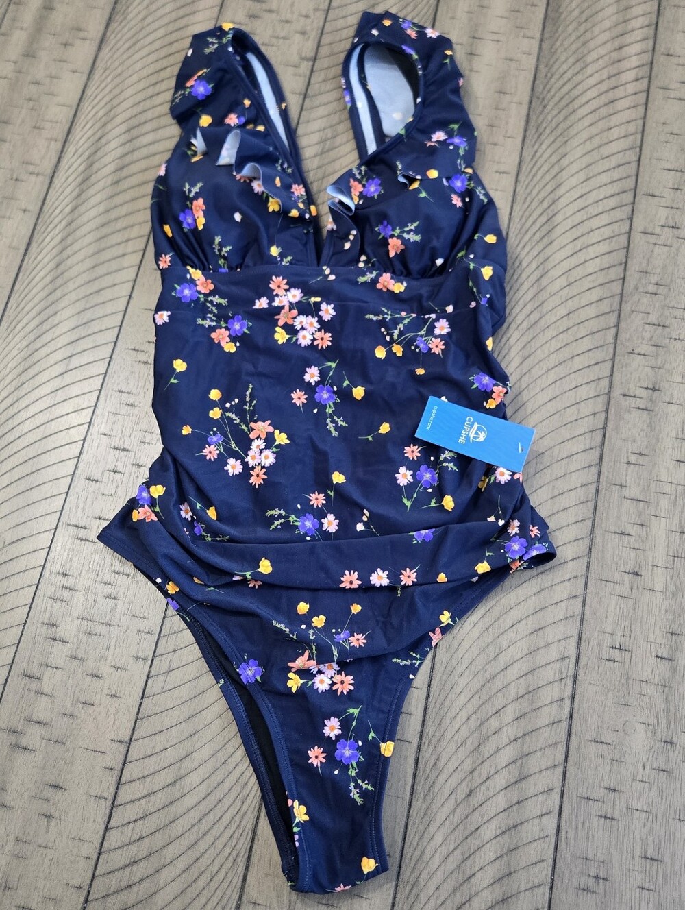 Cupshe Navy One-Piece with Multicolor Floral Print.